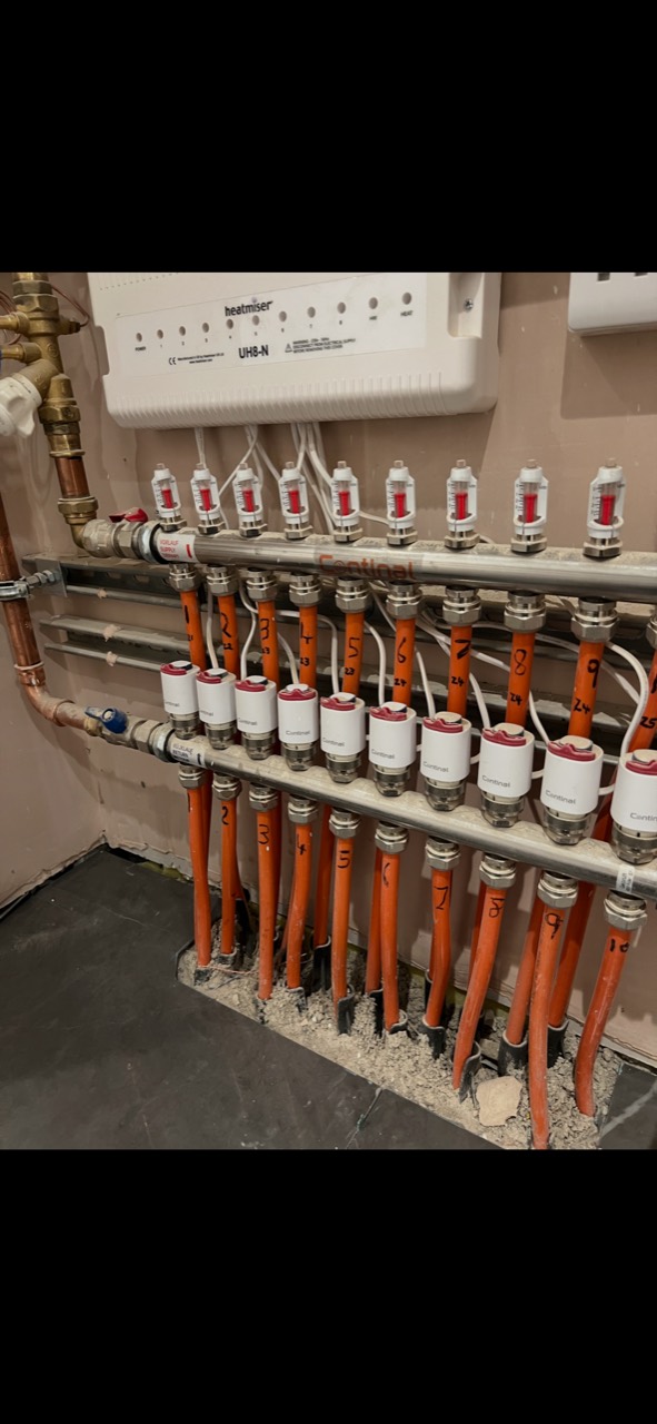 Northwood underfloor heating manifold during assembly